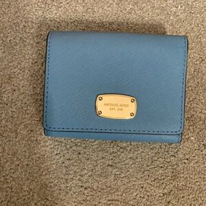 Michael Kors Blue Wallet with Gold Hardware and Minimalist Design